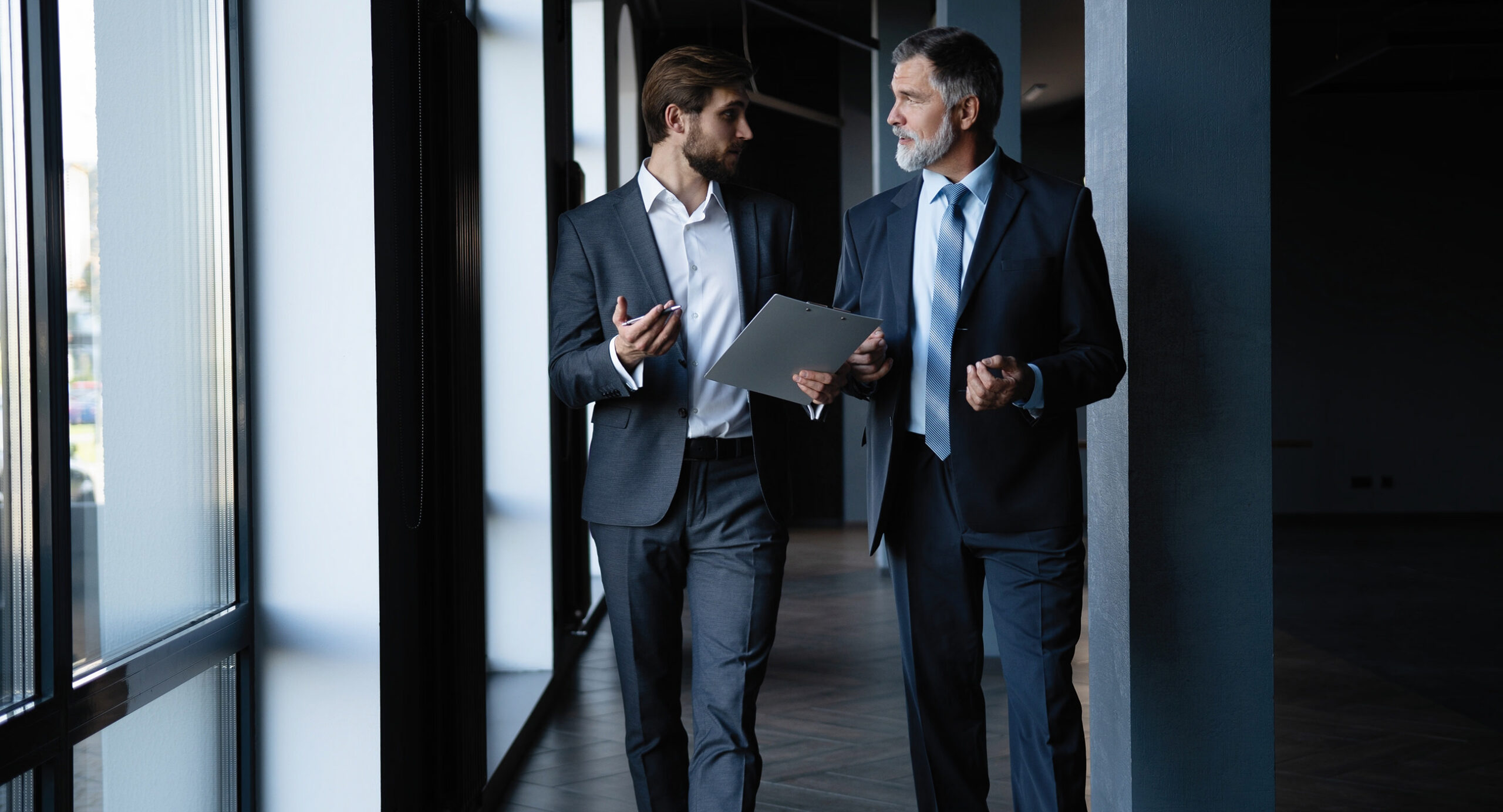 Aviation advisor consulting with a private aircraft buyer, representing expert guidance, aircraft acquisition strategy, and informed purchasing decisions.