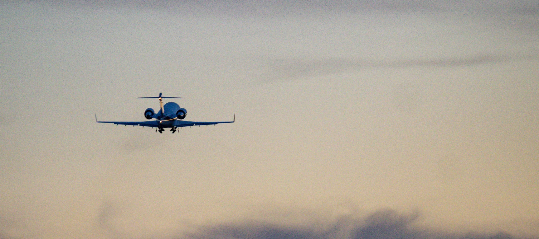 Private jet flying above the clouds, representing FLYUSA Jet Card access to private aircraft for frequent private aviation travelers.