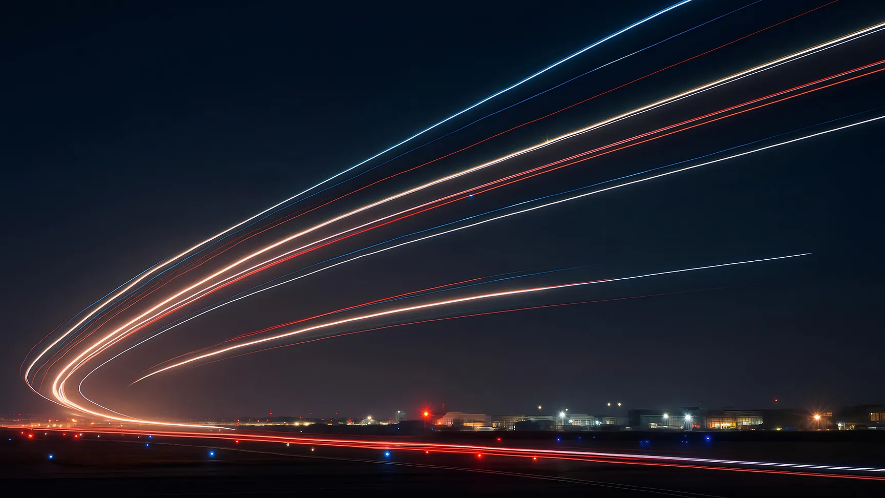 Long-exposure light trails from a departing private aircraft at night, representing the time savings, momentum, and operational freedom created by the right aircraft acquisition.